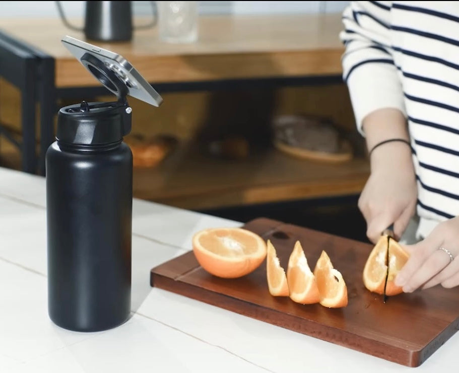 Metanoia Rise 32 oz Water Bottle with 8 oz Bottom Storage & Magnetic Phone Holder Lid